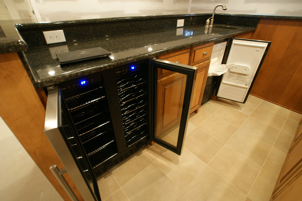 This close up shows the wine fridge which has 2 different temperature zones, and the icemaker which produces fresh ice 24 hours a day.